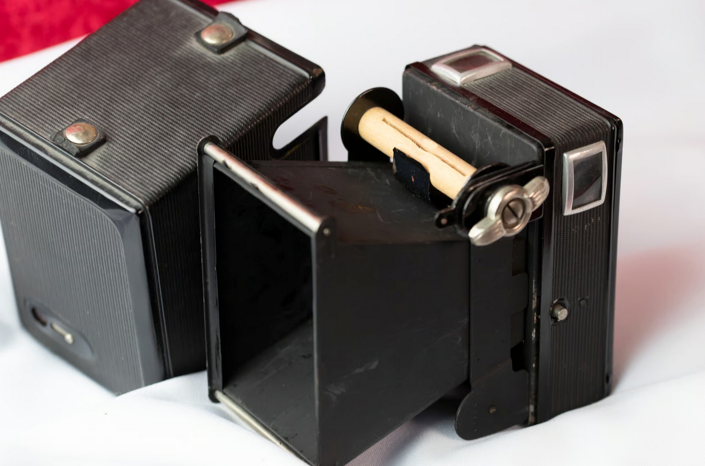 Set von drei antiken Rollfilmkameras